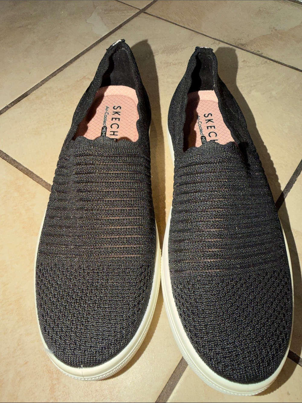 Skechers Black Knit Slip-On Sneakers with White Sole